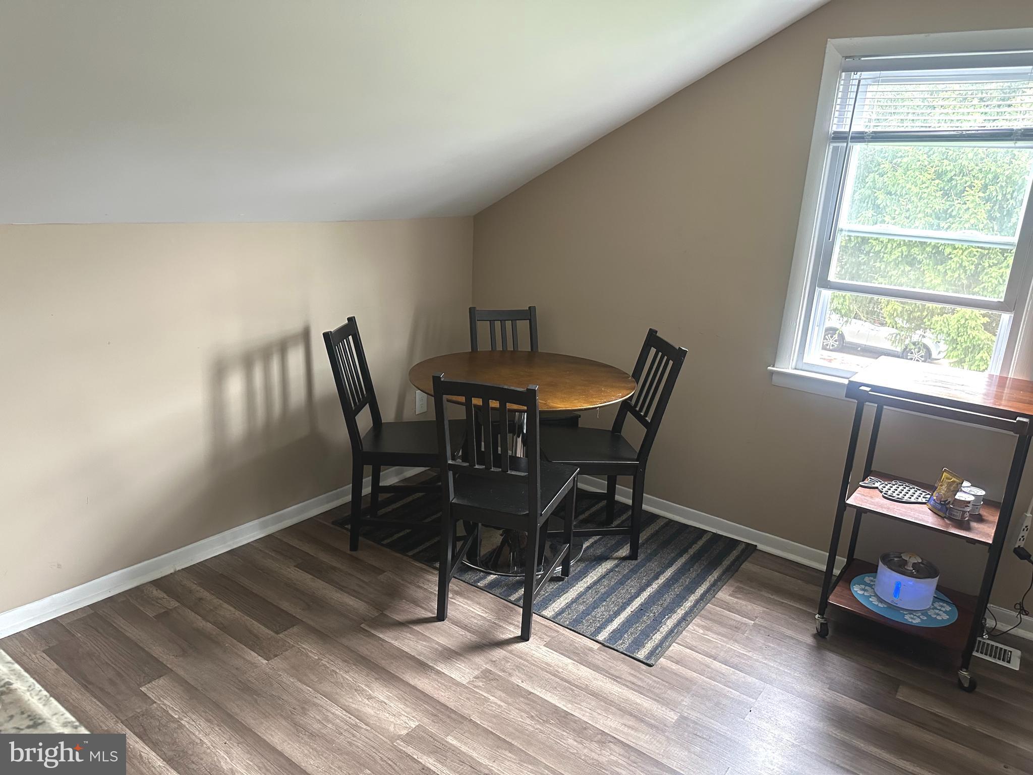 911 Laurel Road Lindenwold, NJ 08021 - Photo 12 of 20 a view of a workspace with furniture and a window