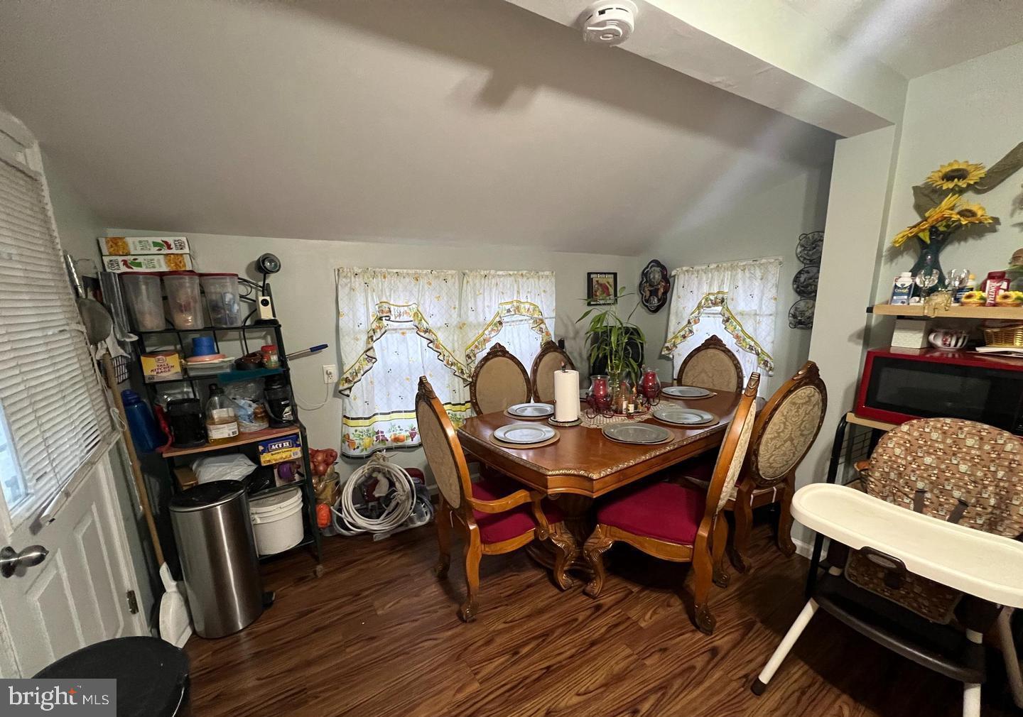 911 Laurel Road Lindenwold, NJ 08021 - Photo 13 of 20 a view of a dining room with furniture and wooden floor