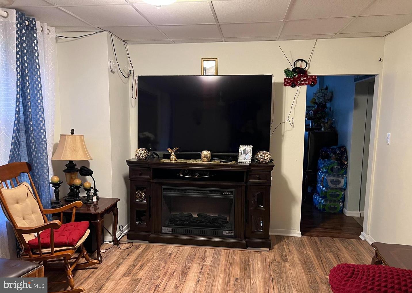 911 Laurel Road Lindenwold, NJ 08021 - Photo 18 of 20 a living room with furniture and a fireplace
