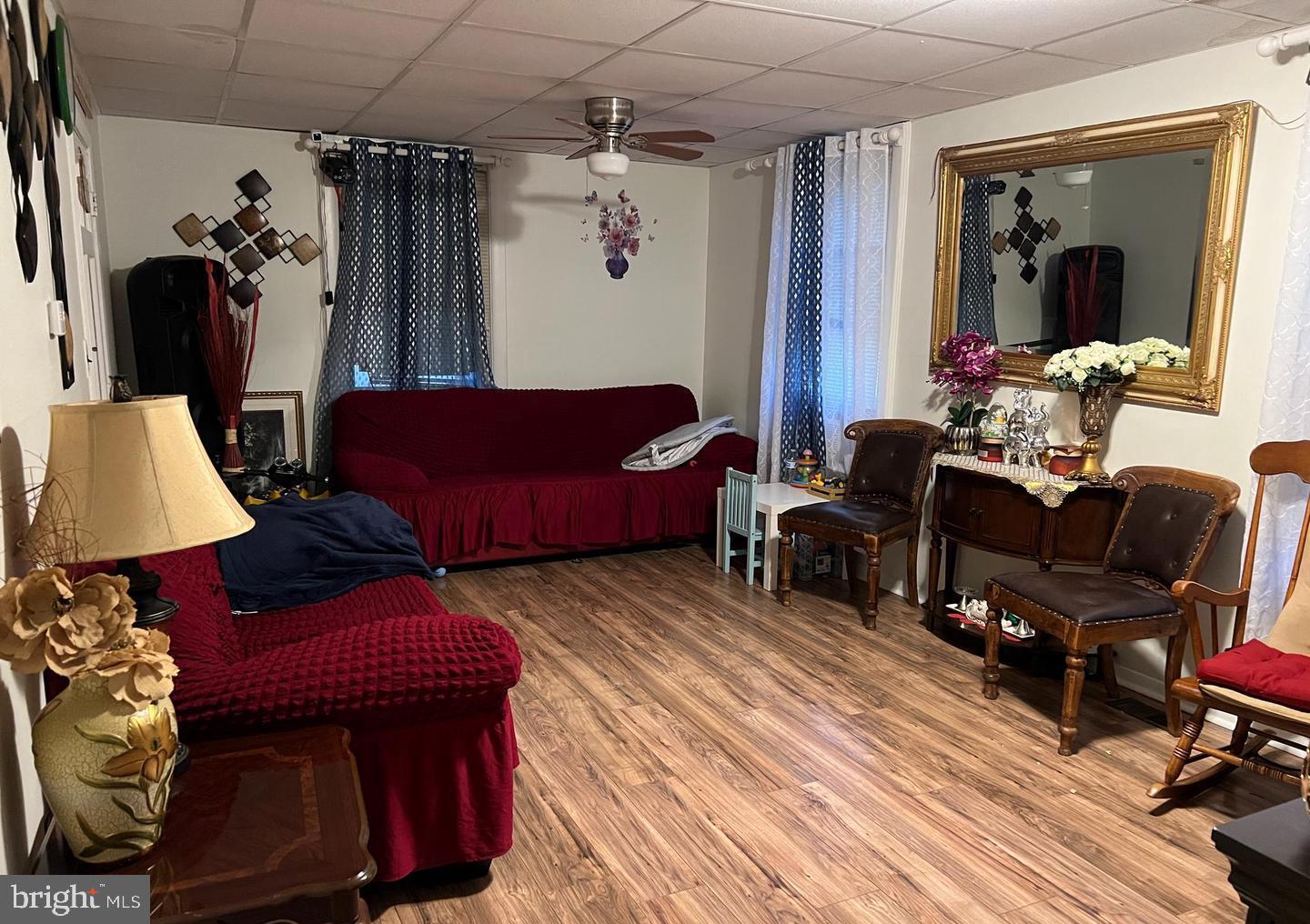 911 Laurel Road Lindenwold, NJ 08021 - Photo 20 of 20 a living room with furniture and a wooden floor