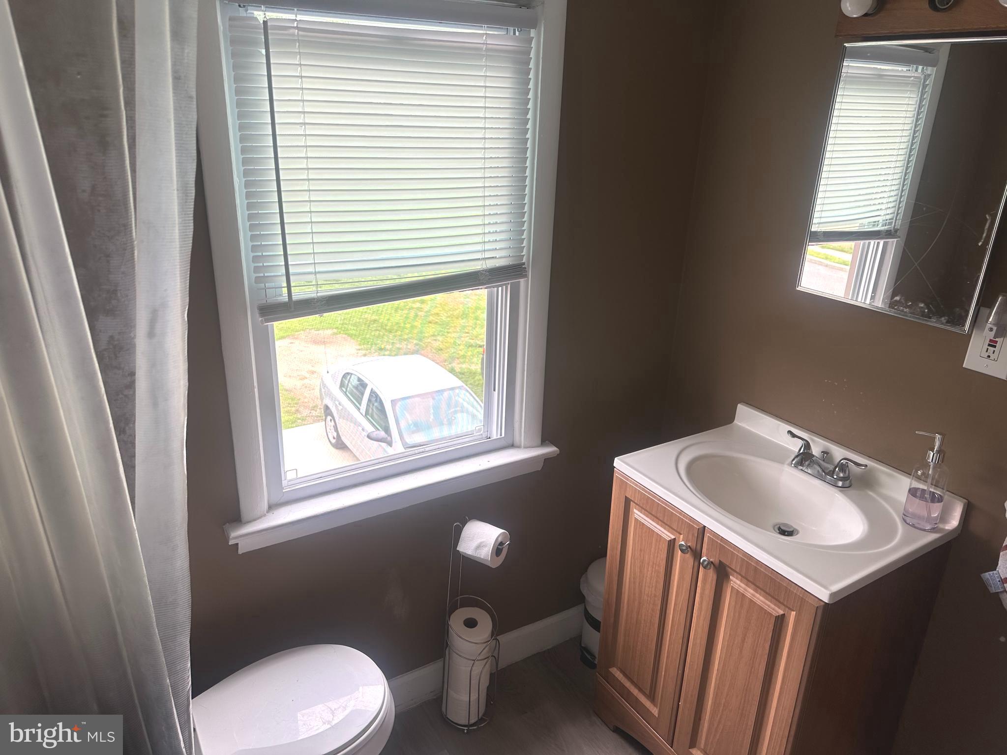 911 Laurel Road Lindenwold, NJ 08021 - Photo 5 of 20 a bathroom with a sink and a toilet