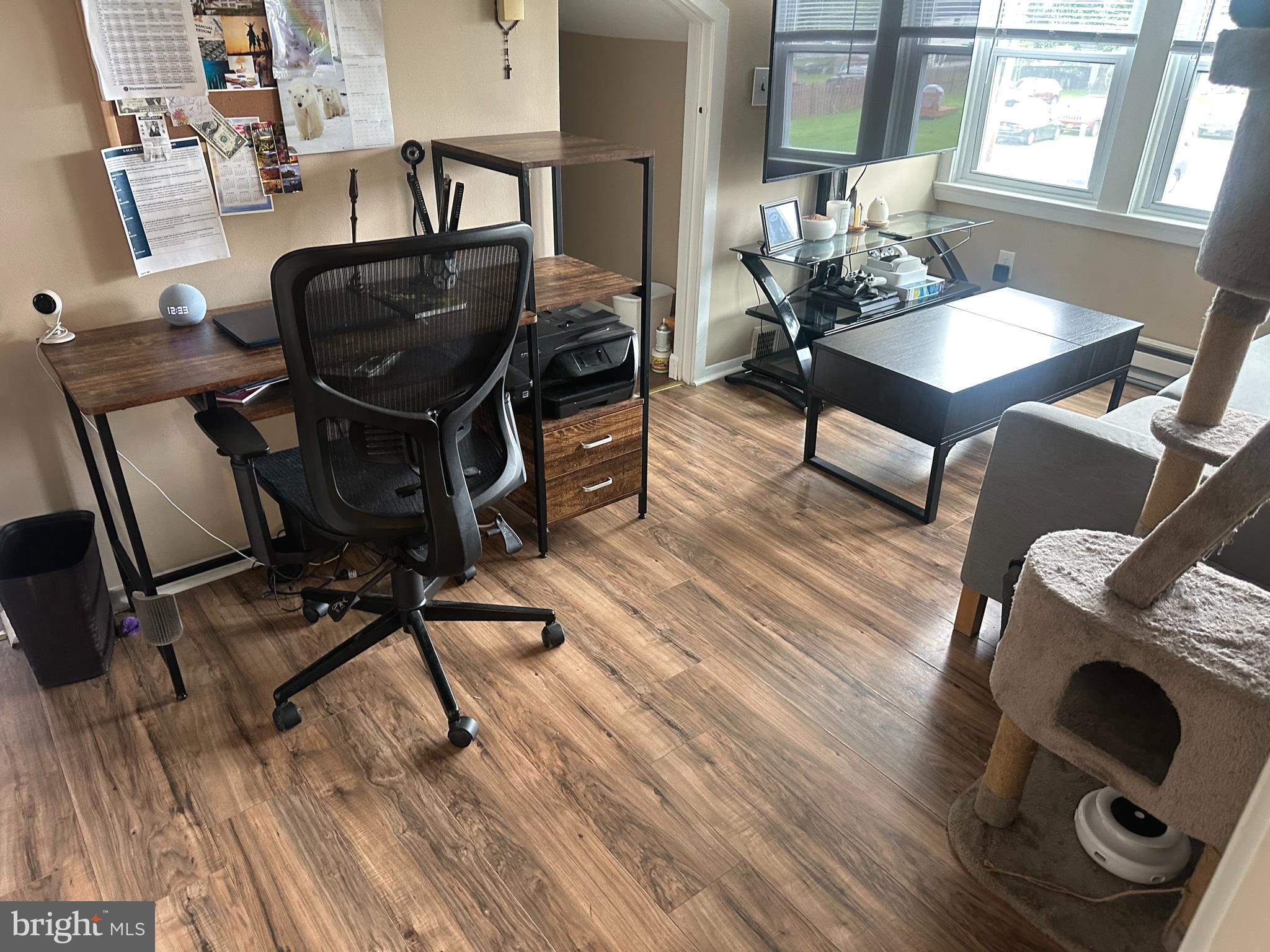 911 Laurel Road Lindenwold, NJ 08021 - Photo 7 of 20 a view of a workspace with furniture and a window