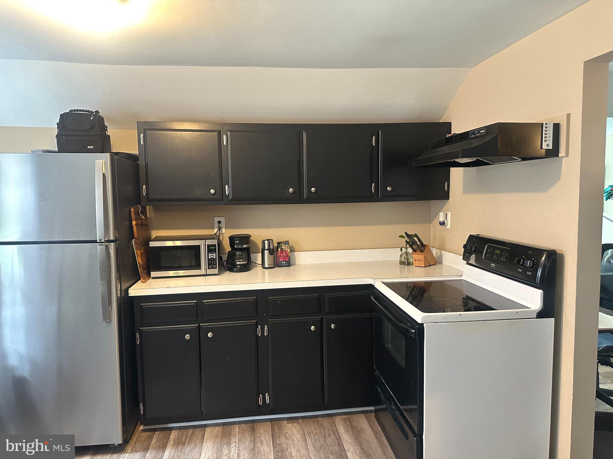 911 Laurel Road Lindenwold, NJ 08021 - Photo 9 of 20 a kitchen with a sink and cabinets