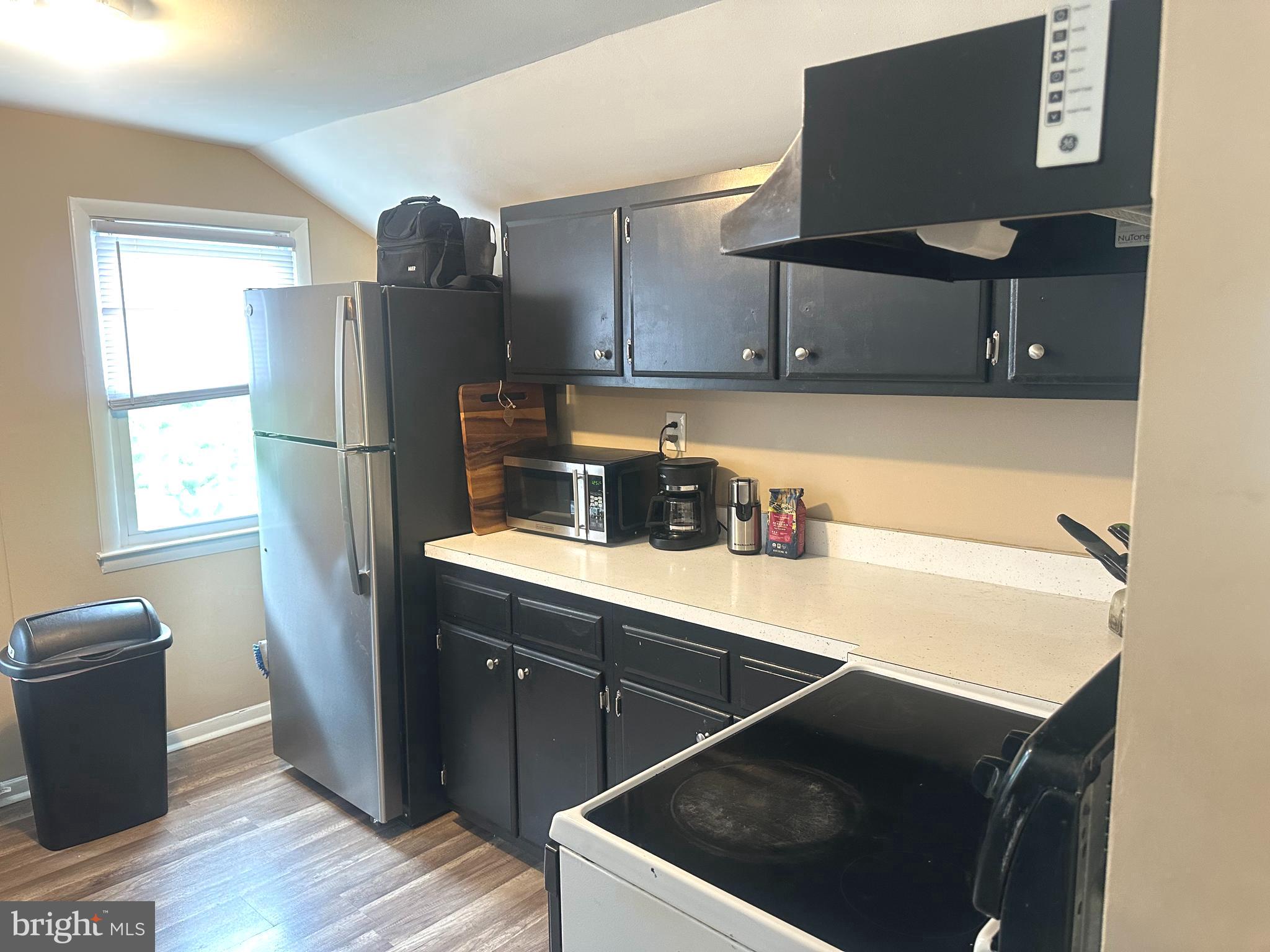 911 Laurel Road Lindenwold, NJ 08021 - Photo 10 of 20 a kitchen with a sink appliances and cabinets