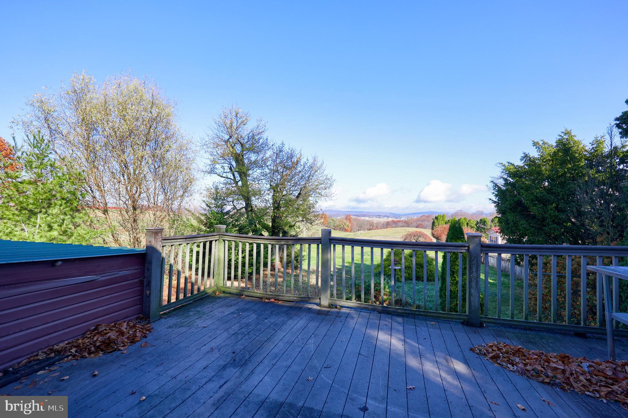 351 East Lexington Road Lititz, PA 17543 - Photo 27 of 36 a view of a deck with wooden floor and fence with a large garden