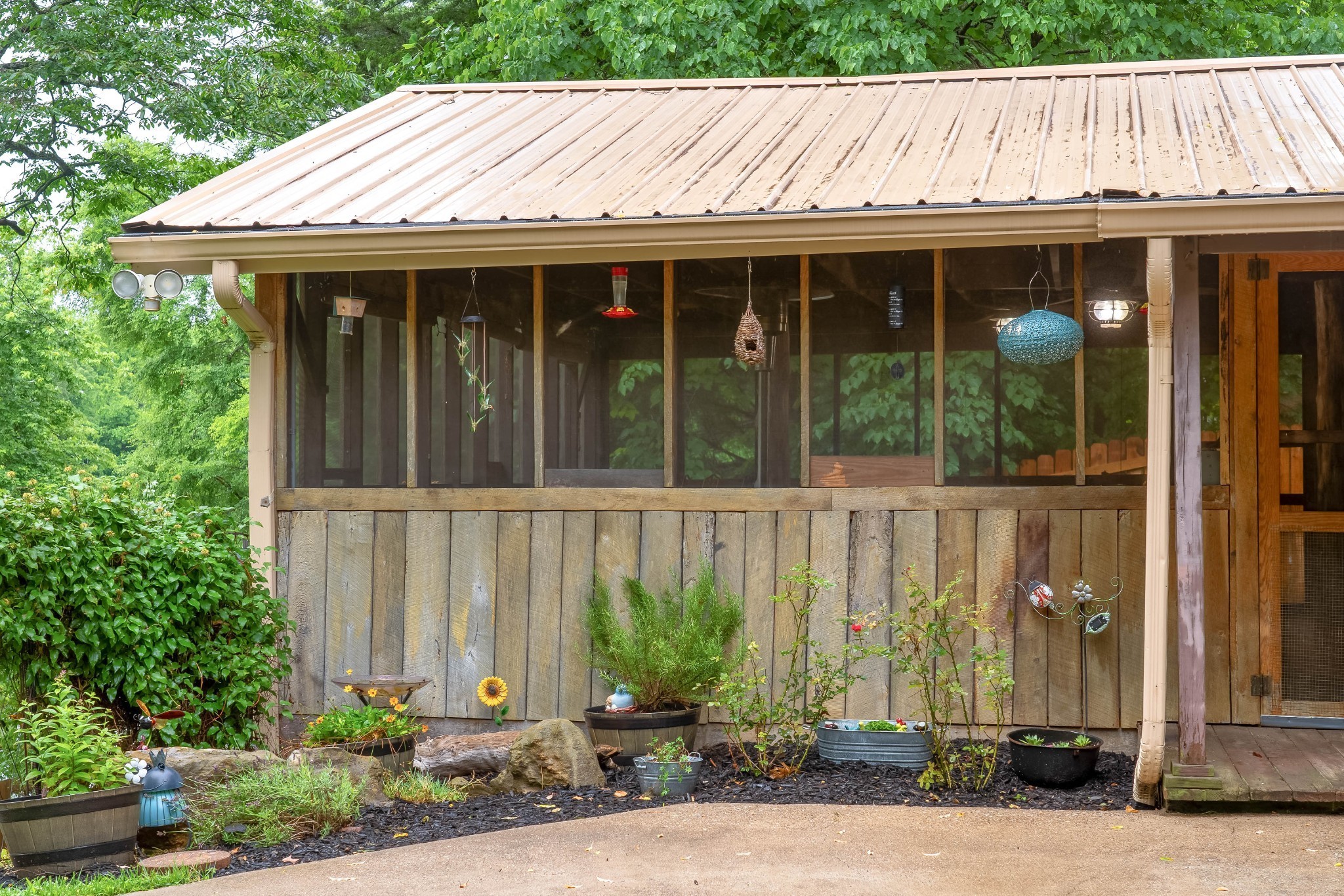 554 Hickman Shores Road Dover, TN 37058 - Photo 17 of 93 a front view of a house with a garden