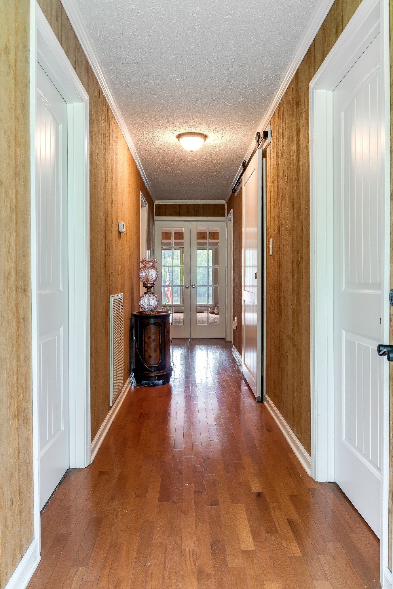 554 Hickman Shores Road Dover, TN 37058 - Photo 20 of 93 a view of a hallway view with wooden floor and staircase