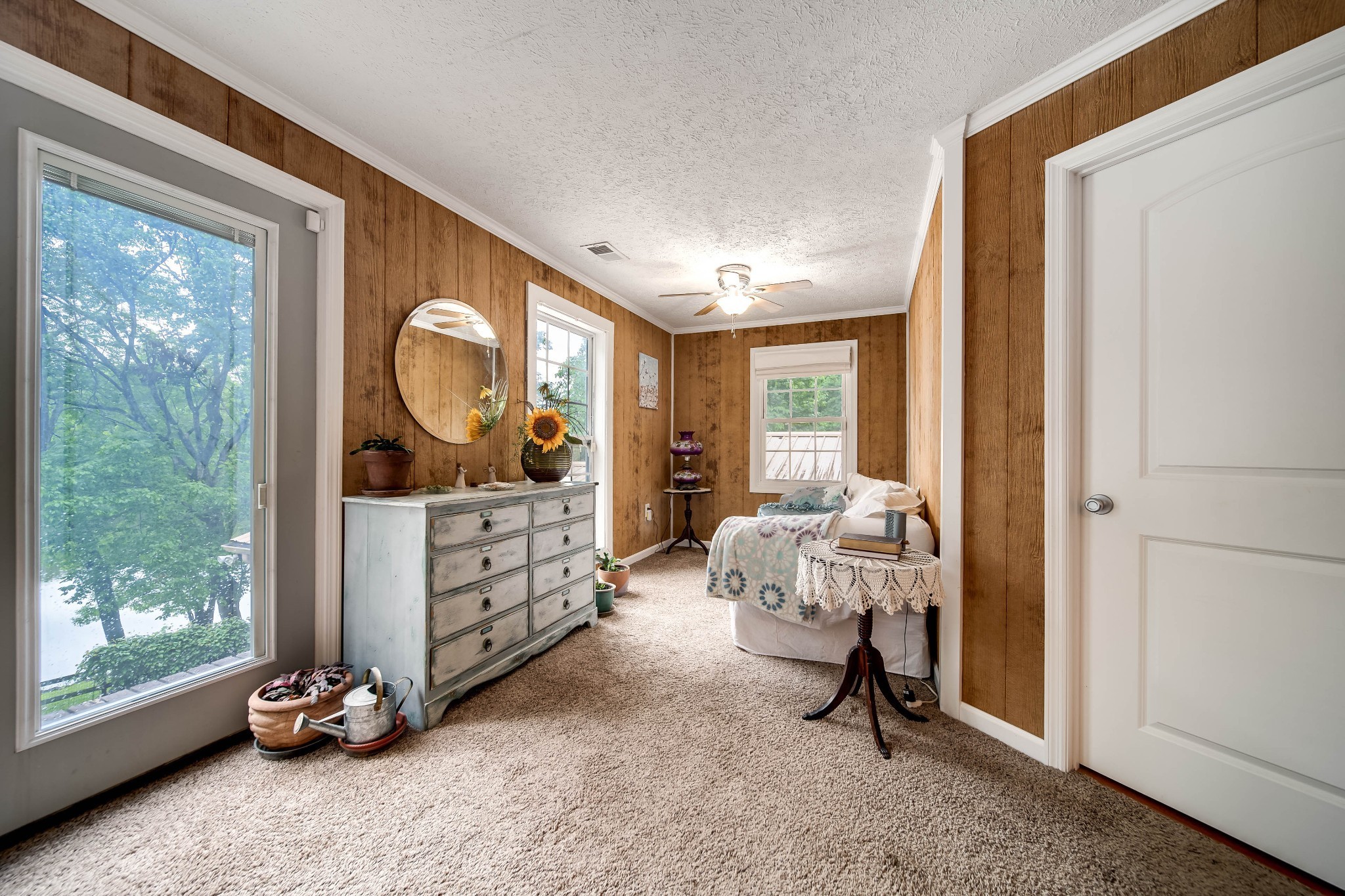 554 Hickman Shores Road Dover, TN 37058 - Photo 32 of 93 a living room with furniture gym equipment and large windows
