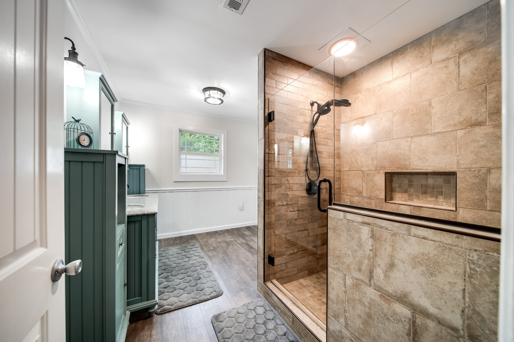 554 Hickman Shores Road Dover, TN 37058 - Photo 36 of 93 a bathroom with a glass shower door and a glass door