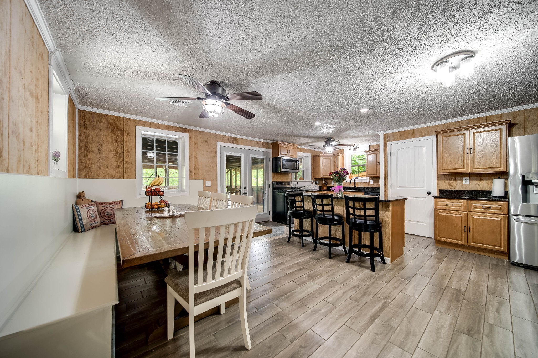 554 Hickman Shores Road Dover, TN 37058 - Photo 49 of 93 a view of a dining room with furniture and wooden floor