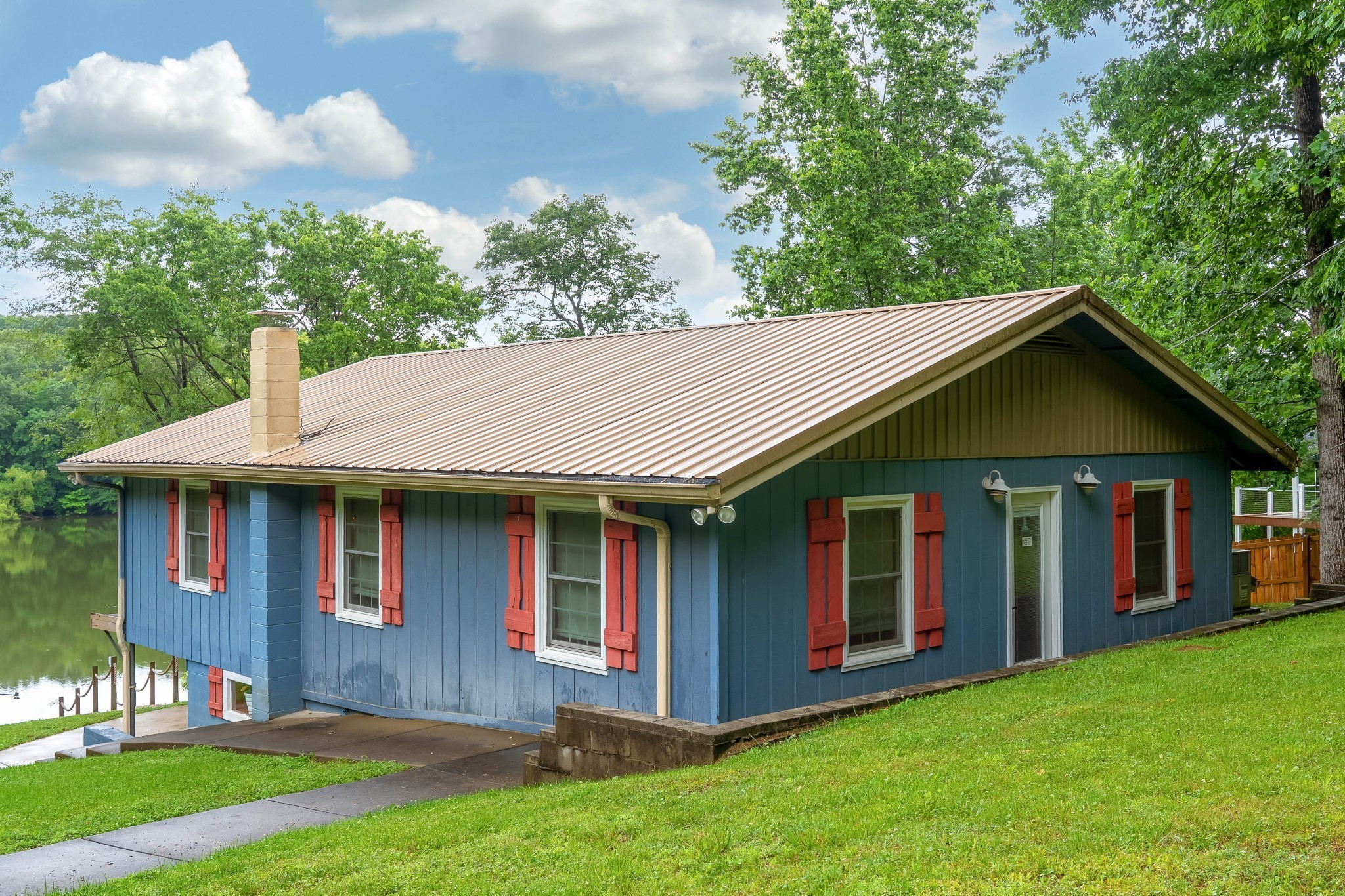 554 Hickman Shores Road Dover, TN 37058 - Photo 5 of 93 a front view of house with yard and green space