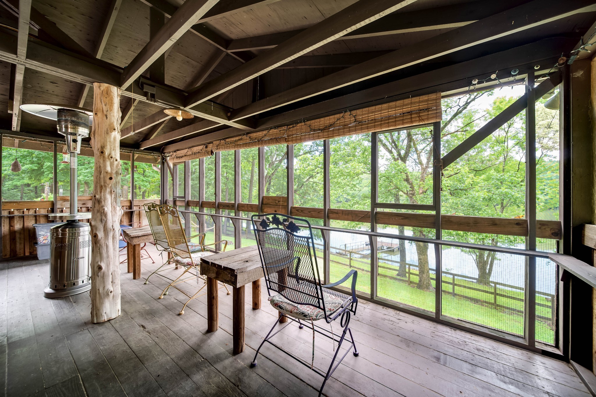 554 Hickman Shores Road Dover, TN 37058 - Photo 64 of 93 a living room with furniture and a floor to ceiling window