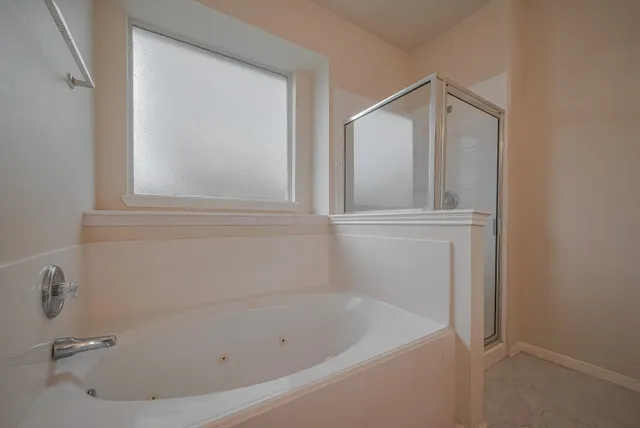 a bathroom with a bathtub