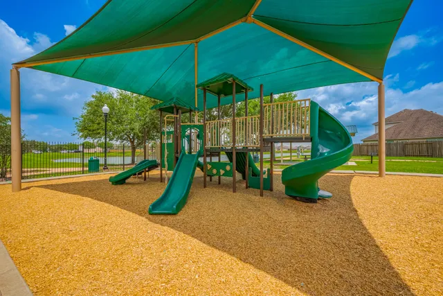 a park with lots of swings and slides