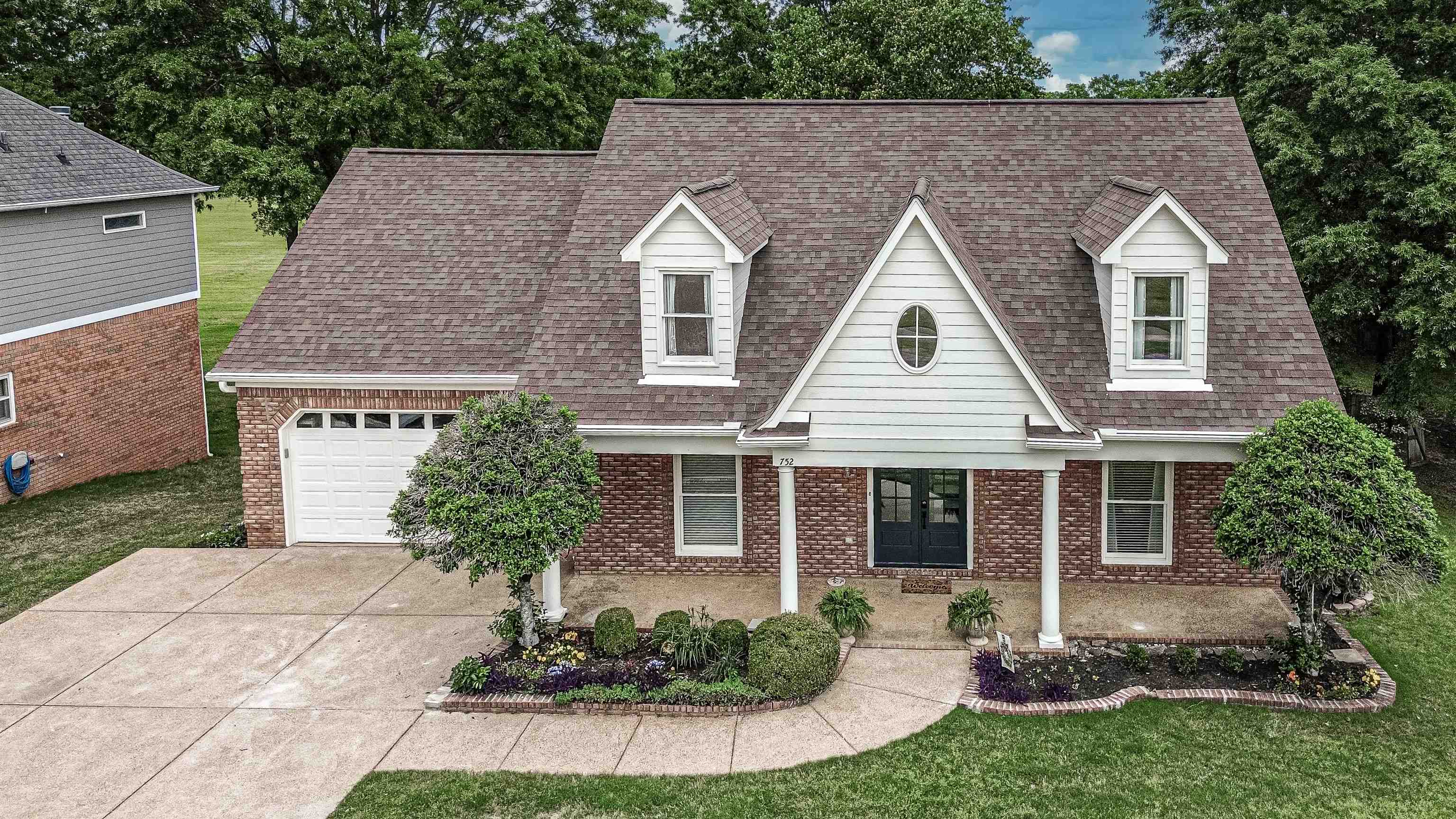 752 Gable Lane Collierville, TN 38017 - Photo 1 of 40 a view of a house with a yard