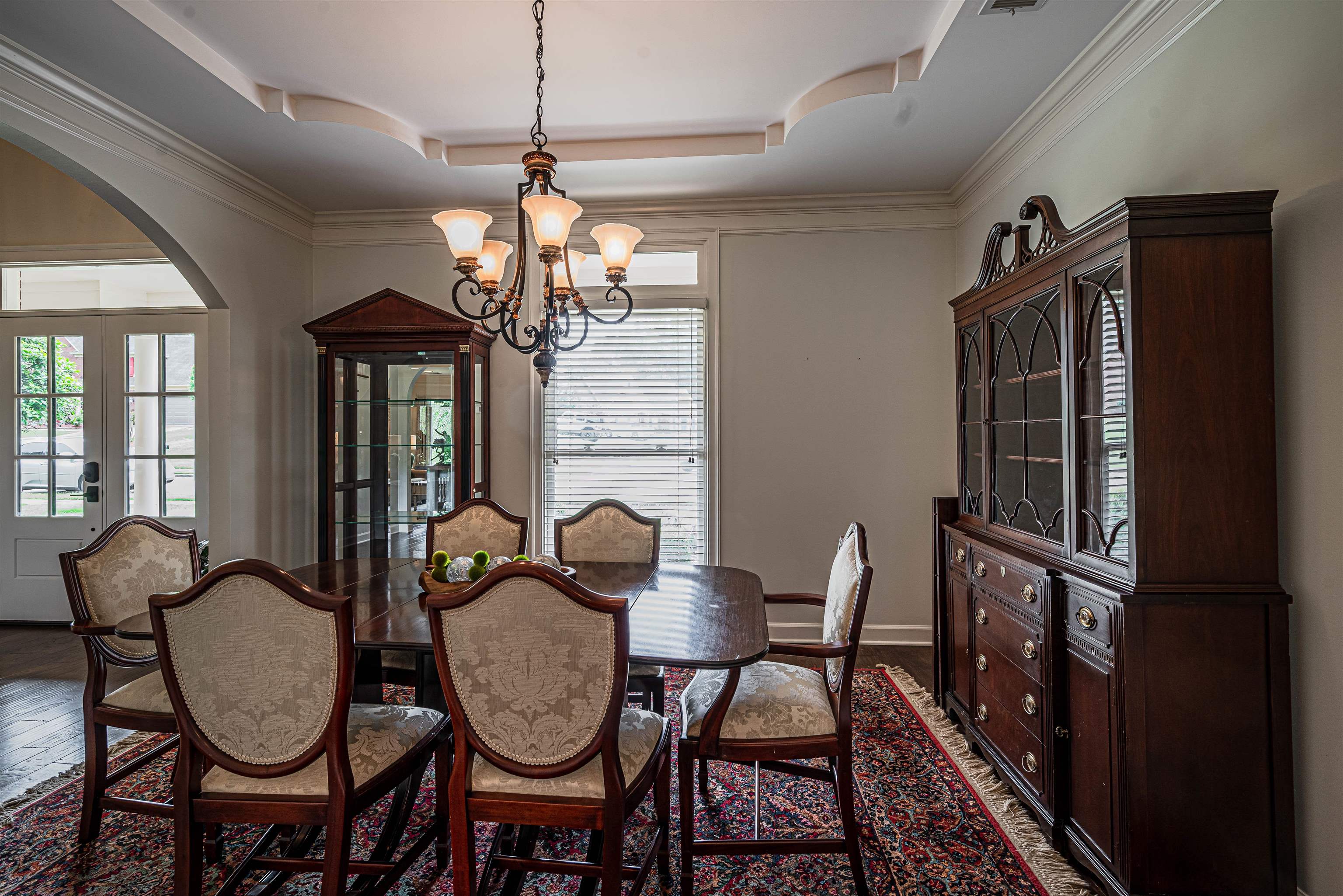 752 Gable Lane Collierville, TN 38017 - Photo 12 of 40 a view of a dining room with furniture wooden floor and chandelier