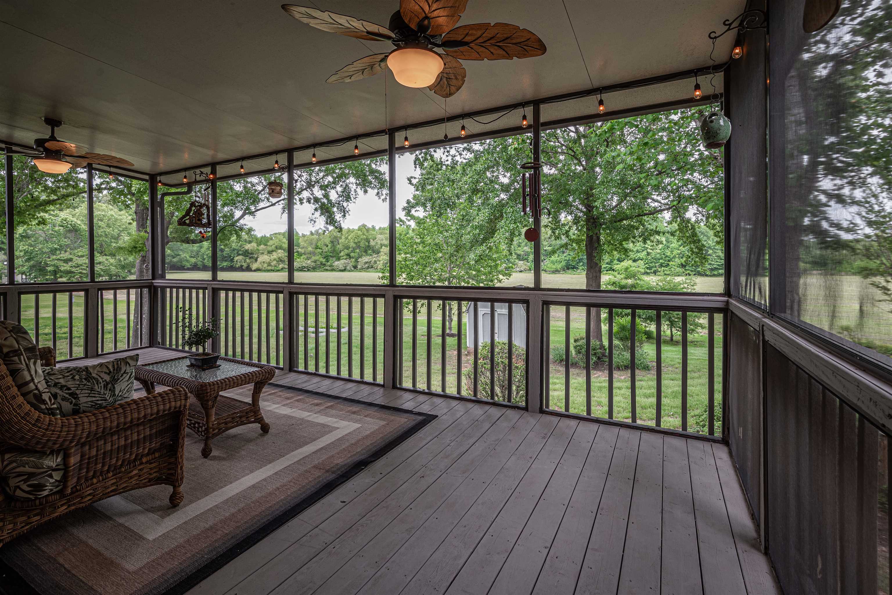 752 Gable Lane Collierville, TN 38017 - Photo 14 of 40 a balcony with wooden floor and outdoor seating