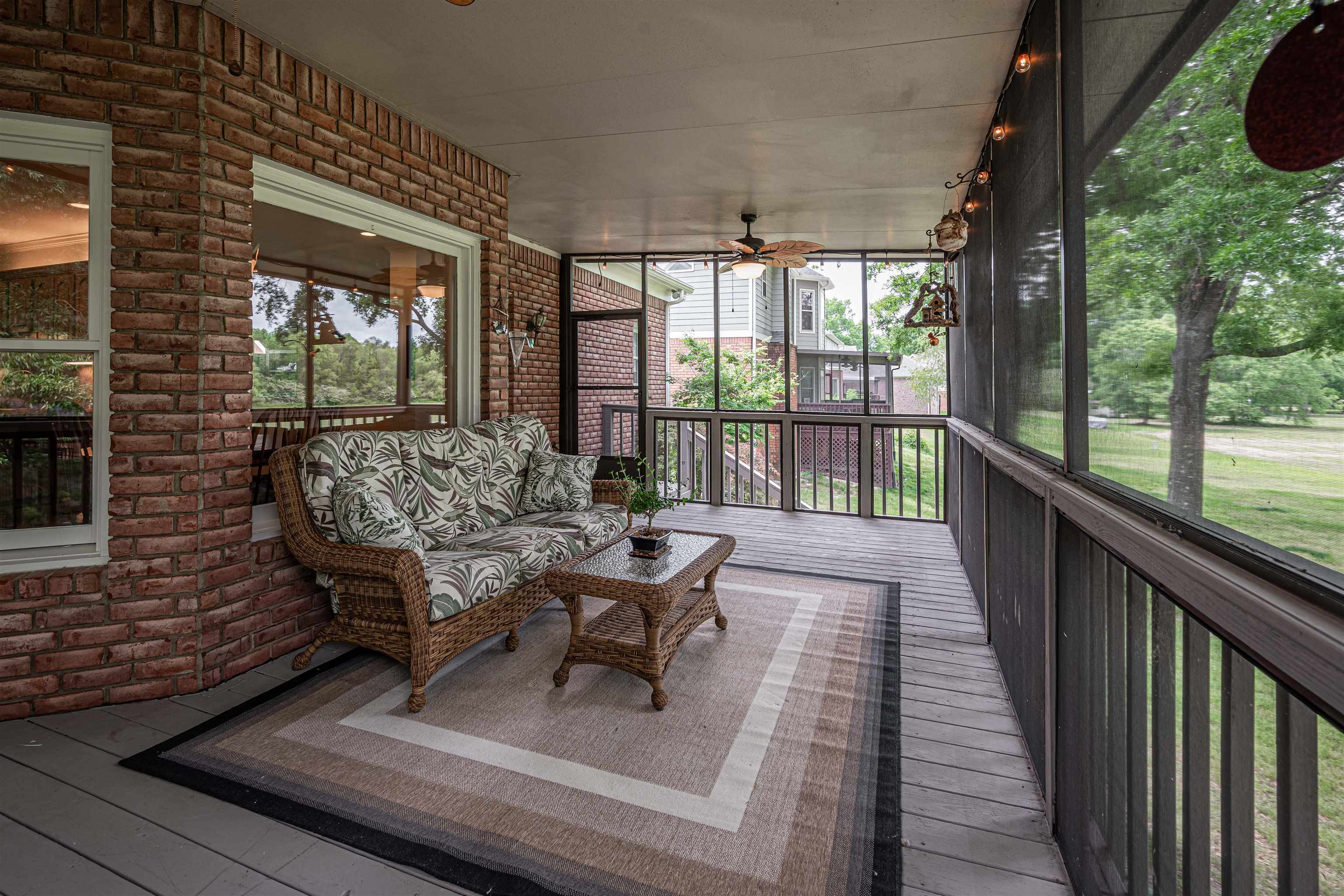752 Gable Lane Collierville, TN 38017 - Photo 15 of 40 a balcony with wooden floor and outdoor seating