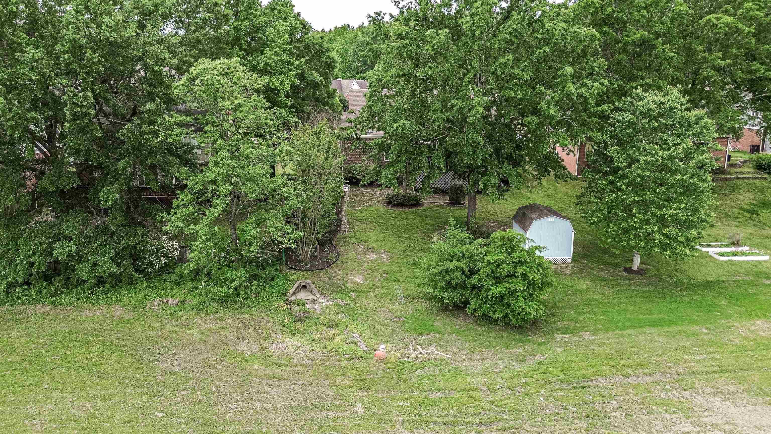 752 Gable Lane Collierville, TN 38017 - Photo 35 of 40 a backyard of a house with a yard and outdoor seating