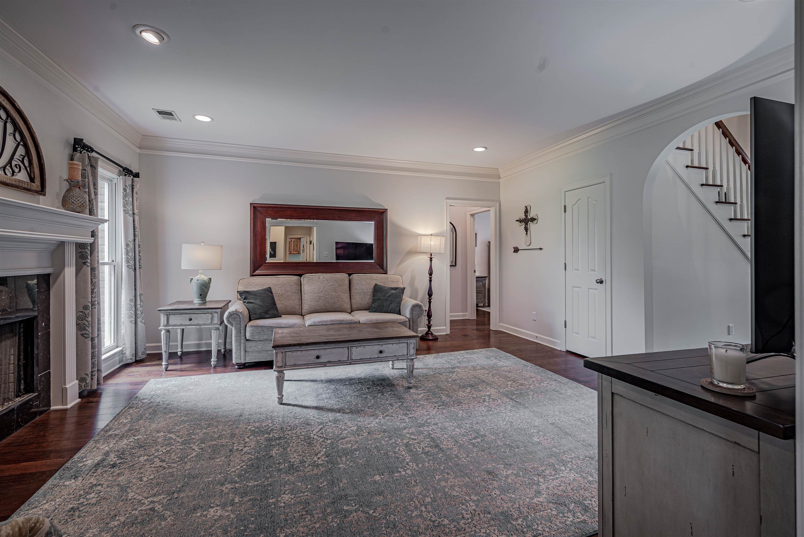 752 Gable Lane Collierville, TN 38017 - Photo 5 of 40 a living room with furniture and a fireplace