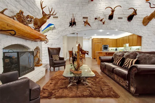 a kitchen with stainless steel appliances granite countertop a refrigerator sink and cabinets