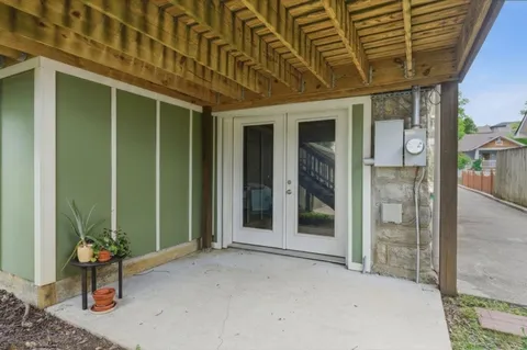 a view of a porch with seating space