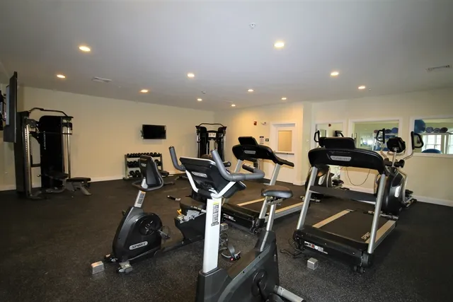 a view of a room with gym equipment