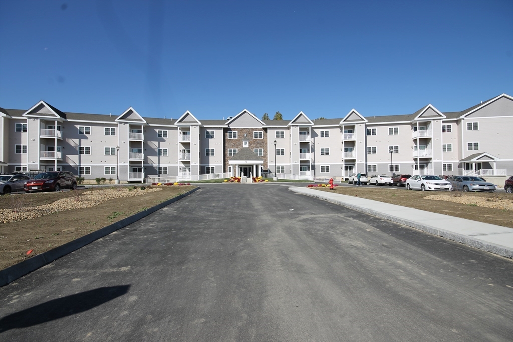 1 Regency Village Way, Unit 316 Merrimac, MA 01860 - Photo 25 of 25 a view of city with tall buildings