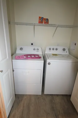 a utility room with dryer and washer