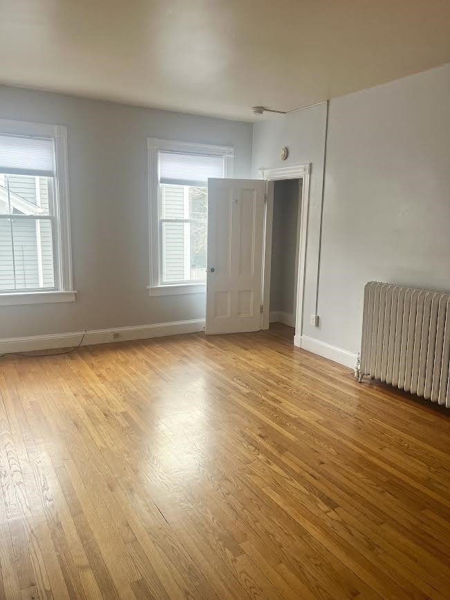 9 Sherman Street Newport, RI 02840 - Photo 9 of 15 Bedroom is off of the living room