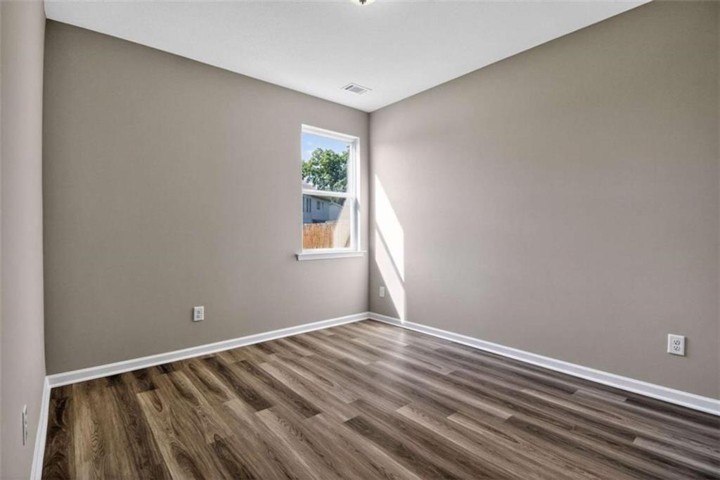 103 Gnome Court Perry, GA 31069 - Photo 25 of 30 a view of room with window and hardwood floor