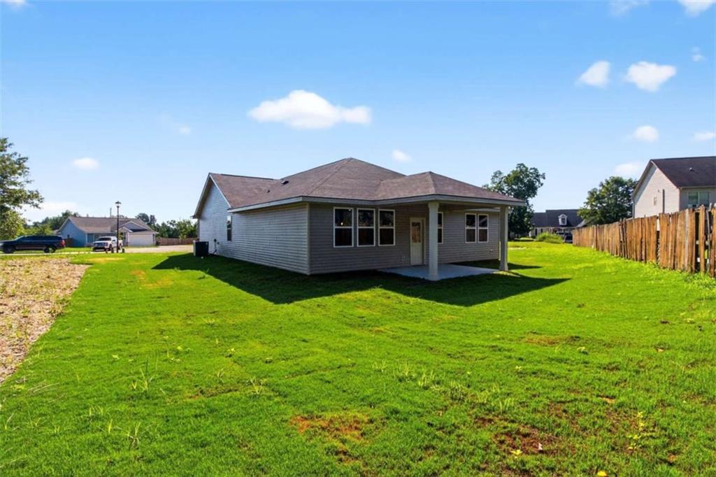 103 Gnome Court Perry, GA 31069 - Photo 4 of 30 a view of a house with a backyard