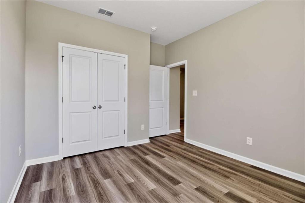 103 Gnome Court Perry, GA 31069 - Photo 9 of 30 a view of a room with wooden floor