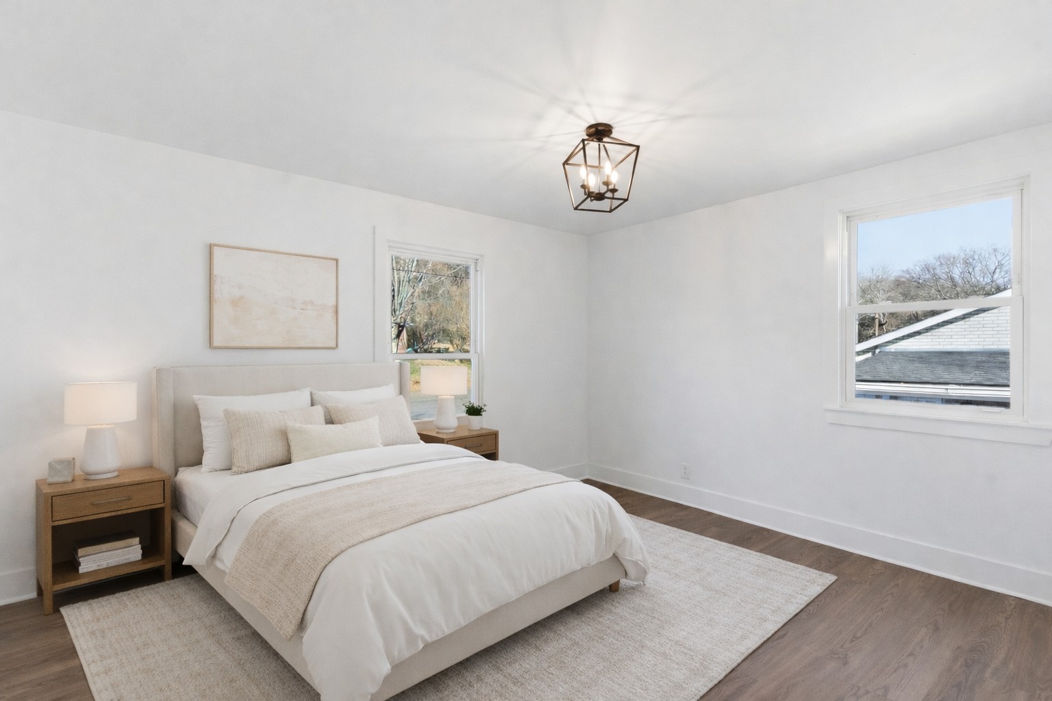 206 New Sawyer Brown Road Nashville, TN 37221 - Photo 3 of 46 a bedroom with a bed and a painting on the wall