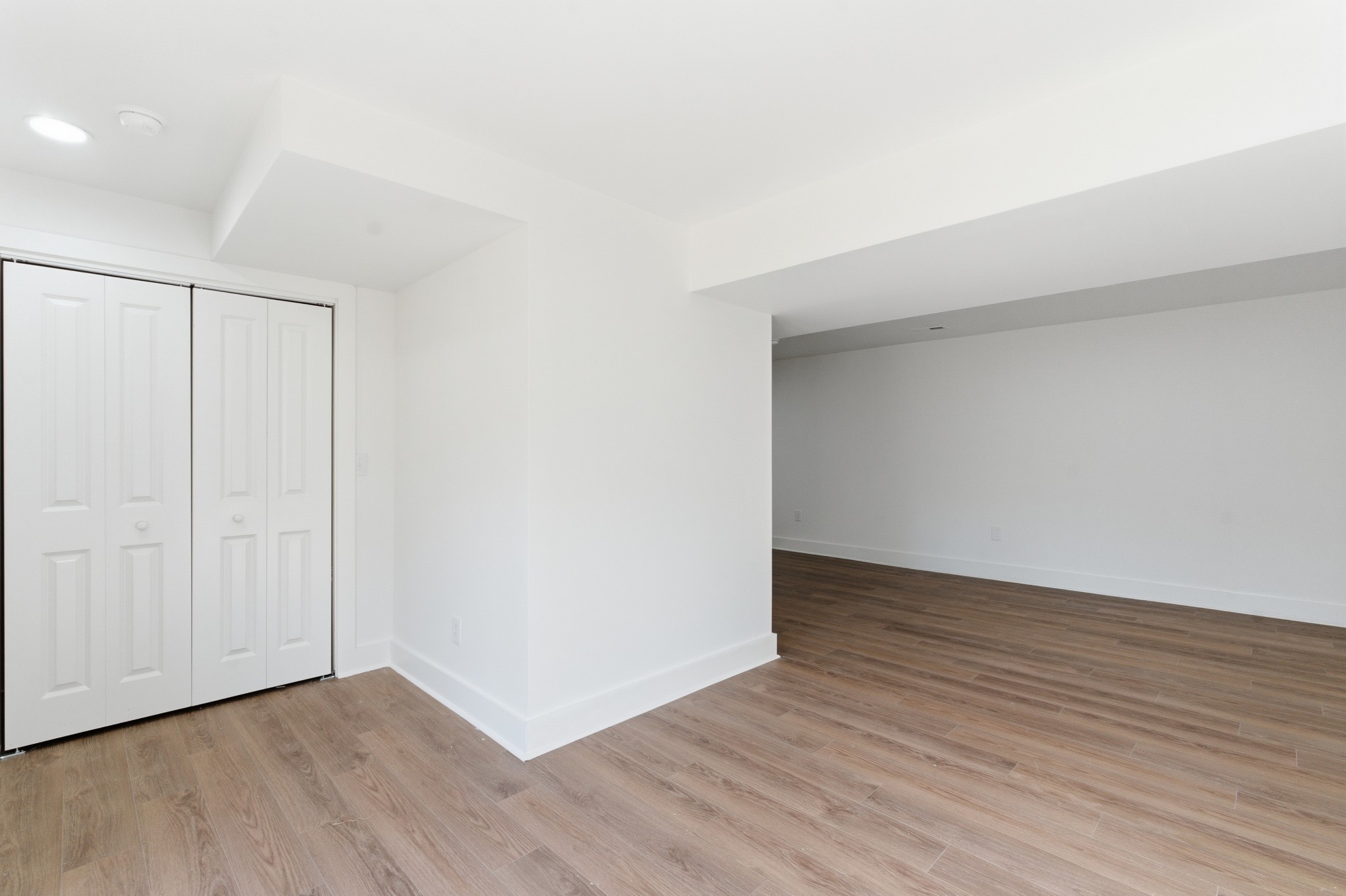 206 New Sawyer Brown Road Nashville, TN 37221 - Photo 33 of 46 a view of an empty room with wooden floor