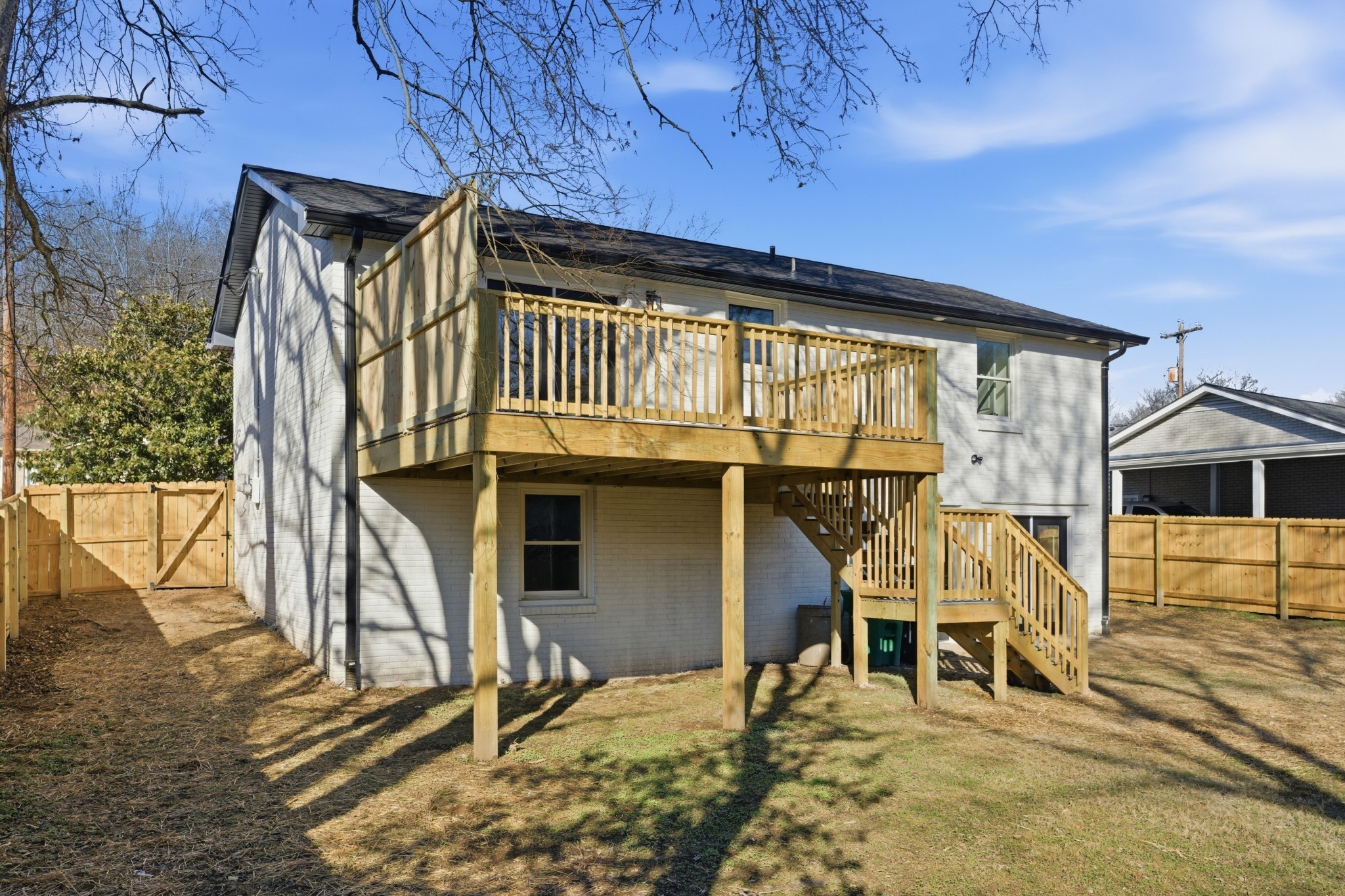 206 New Sawyer Brown Road Nashville, TN 37221 - Photo 42 of 46 a view of a house with wooden deck front of house
