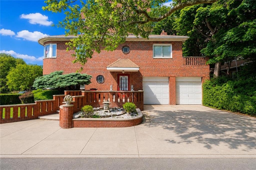 1 Bay Ridge Parkway Brooklyn, NY 11209 - Photo 1 of 38 a front view of a house with a garden and plants