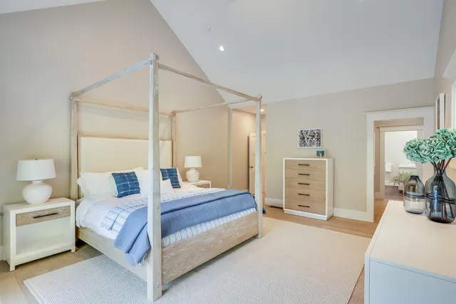 a bathroom with a toilet a sink and shower