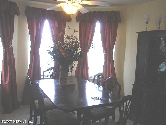 54346 Dornbush Road Callahan, FL 32011 - Photo 3 of 12 a view of entryway and livingroom with furniture