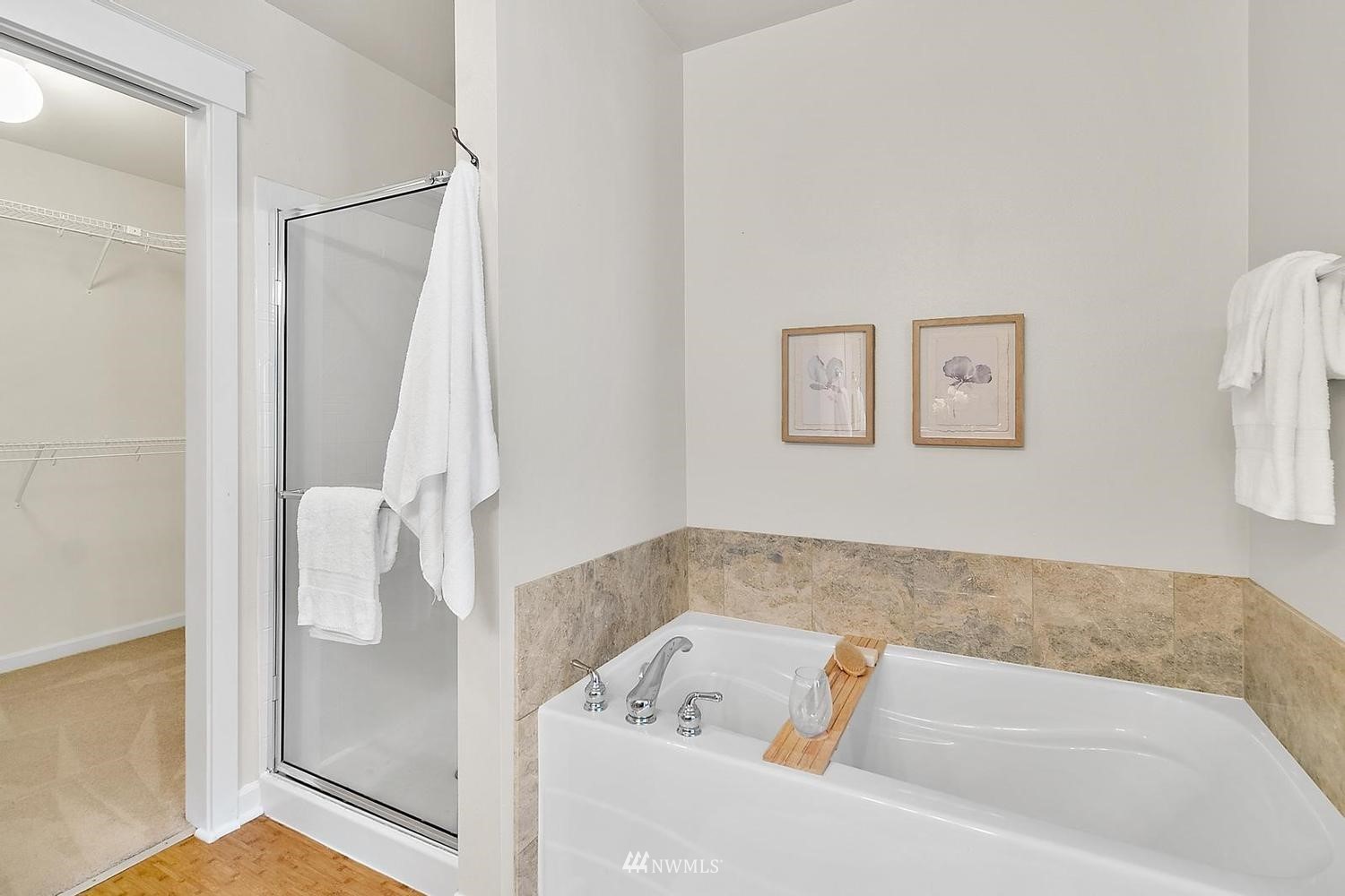 91 East Soderberg Road, Unit E14 Allyn, WA 98524 - Photo 20 of 40 a bathroom with a bathtub