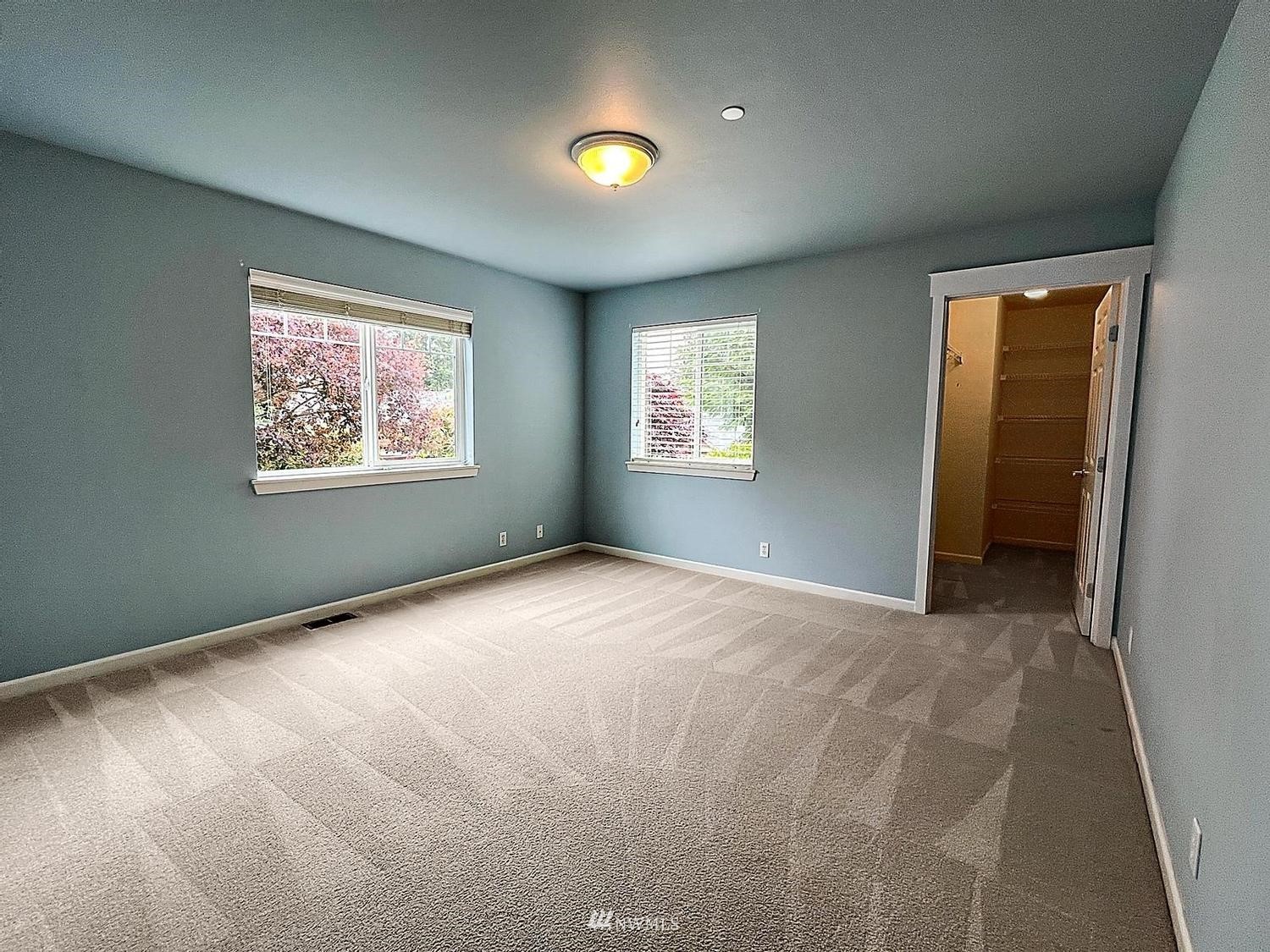 91 East Soderberg Road, Unit E14 Allyn, WA 98524 - Photo 24 of 40 a view of an empty room with a window