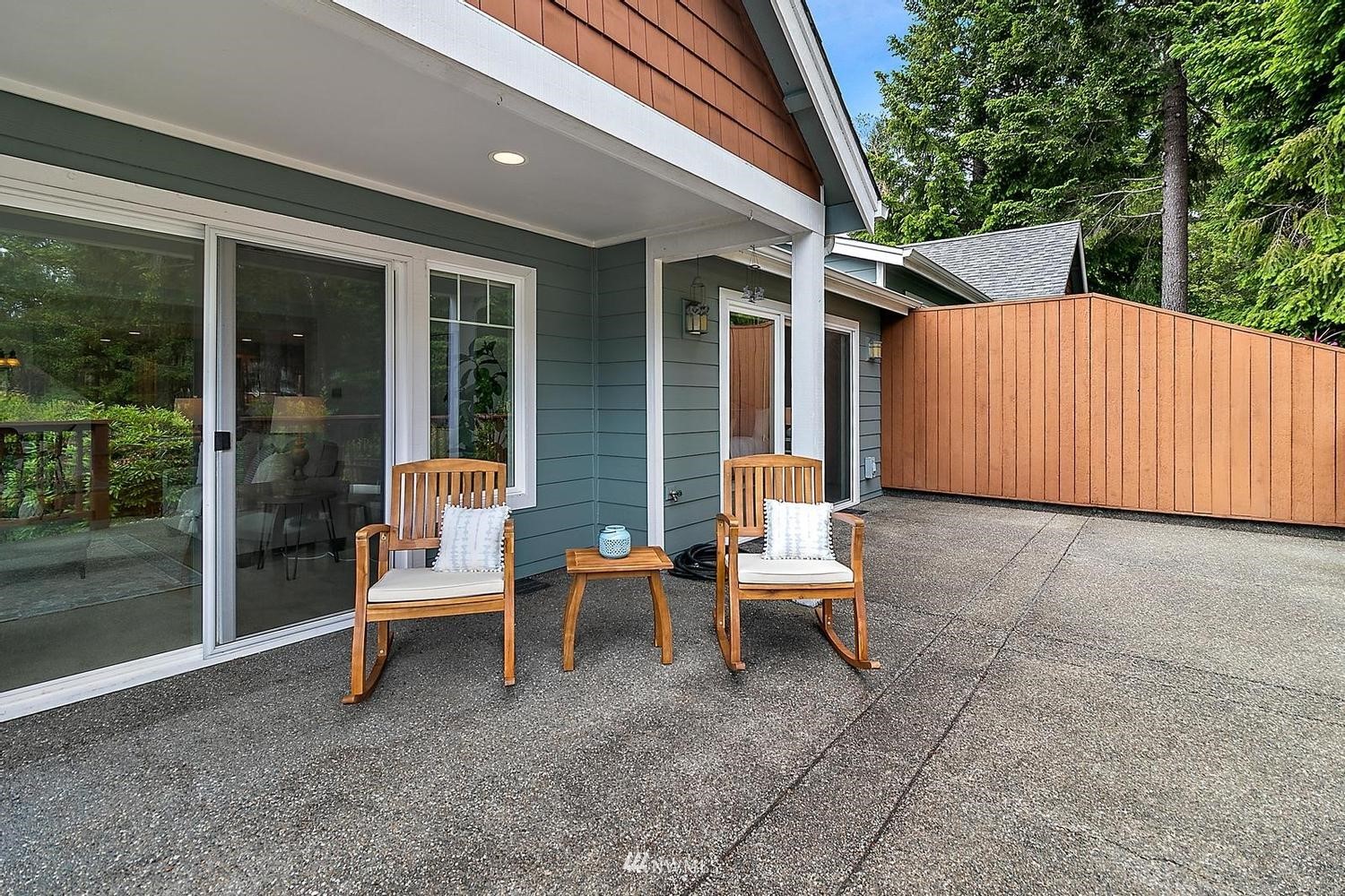 91 East Soderberg Road, Unit E14 Allyn, WA 98524 - Photo 6 of 40 a outdoor space with patio furniture and garden