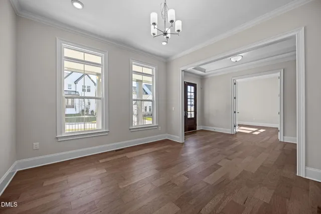 a view of livingroom with hardwood floor and ceiling fan