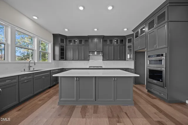 a view of an empty room and closet area