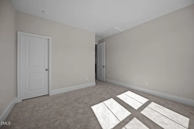 a view of a room with an empty space