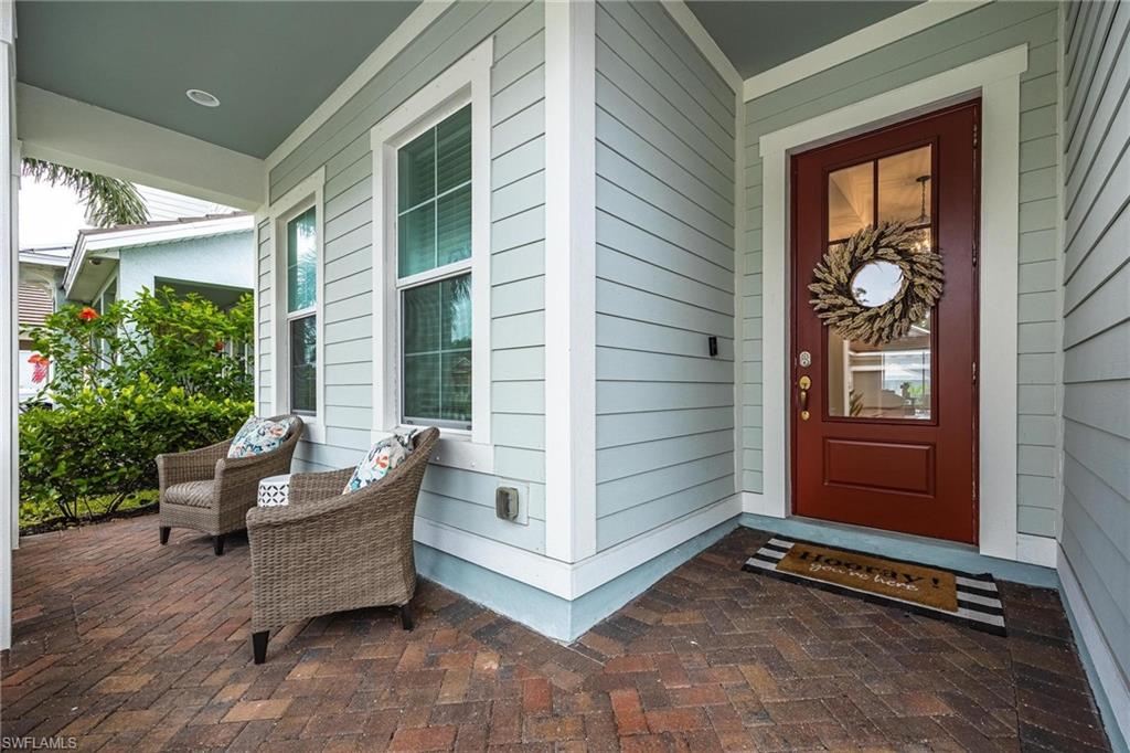 3621 Pilot Circle Naples, FL 34120 - Photo 2 of 46 a living room with furniture and windows