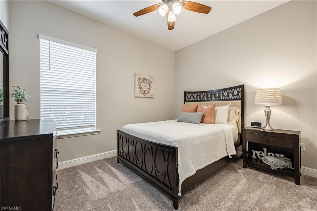 3621 Pilot Circle Naples, FL 34120 - Photo 31 of 46 a bedroom with a bed and a window