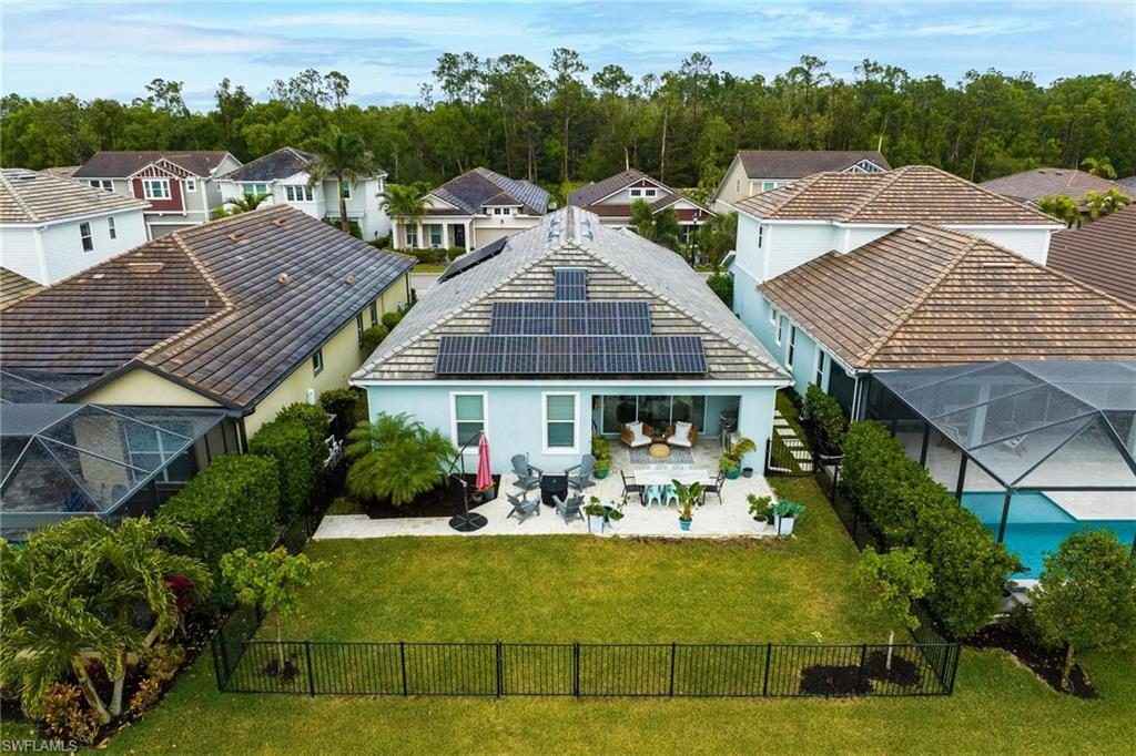 3621 Pilot Circle Naples, FL 34120 - Photo 33 of 46 an aerial view of a house with a garden and plants