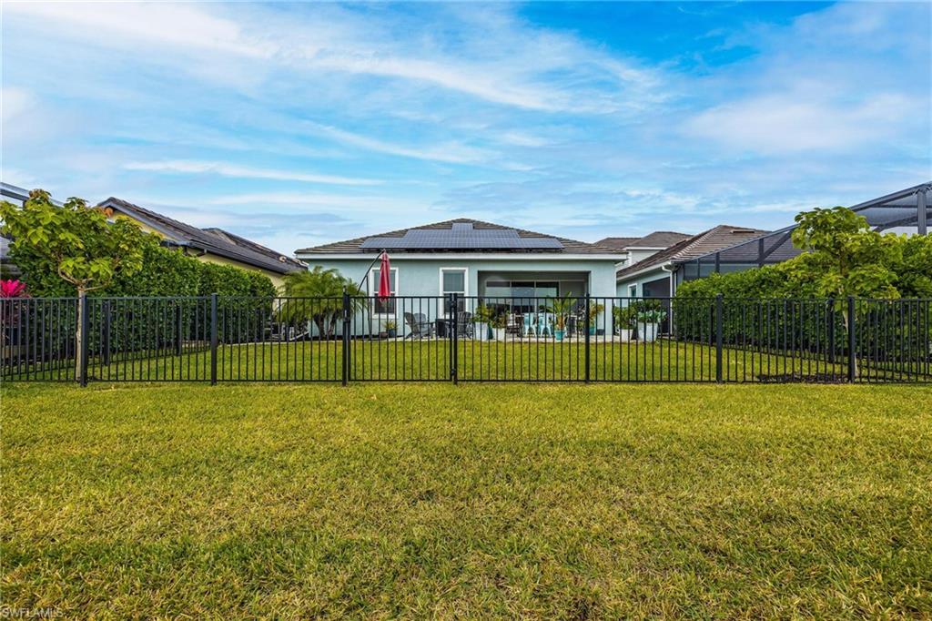 3621 Pilot Circle Naples, FL 34120 - Photo 43 of 46 a view of a house with a big yard and a big yard