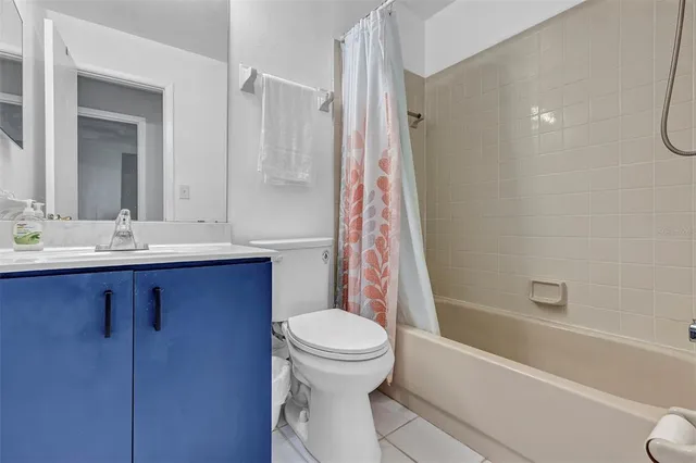 a view of backyard with a table and chairs